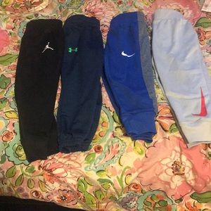 Four pair of pants Nike/under armour/ Jordan